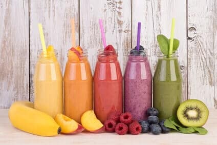 Fruit smoothies variety in rainbow colors